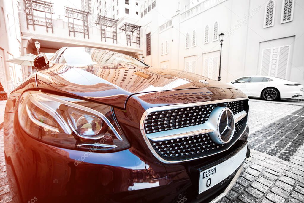 Dubai, United Arab Emirates  February 5, 2021 - radiator grille and the logo of Mercedes close up. C 250 Coupe.