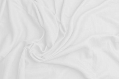 Üst görünüm beyaz keten soyut dalga lüksü. Beyaz kumaş soyut doku arkaplanıdır.
