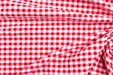 Kumaş tekstil buruşmuş arka plan. Masa örtüsü pikniği Kırmızı, beyaz doku kontrolörleri.