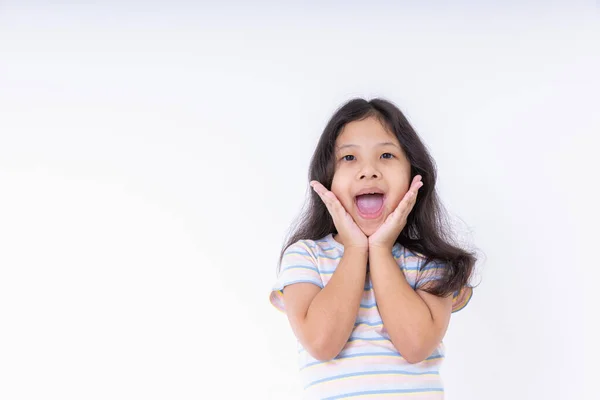 stock image Asian kid girls are very cute smiles very happy, cheerful, bright, positive attitude, Photography standing in a studio with white background and copy space.