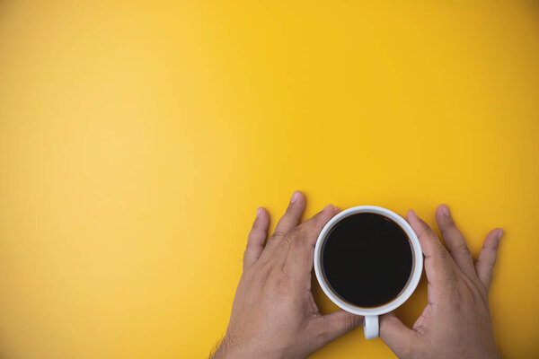 Hand Man Holding White Cup Hot Black Coffee Yellow Background Royalty Free Stock Photos