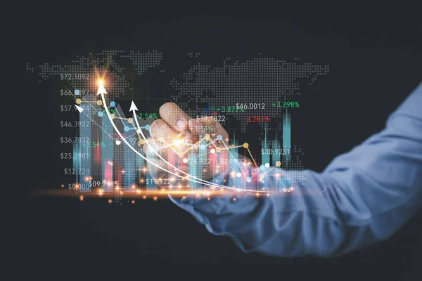 A man using a pen touching on growth graph virtual screen on hand to analyze for an investment of corporate. Business, and Finance concept. Analysis, strategy, and planning for business profit goals.