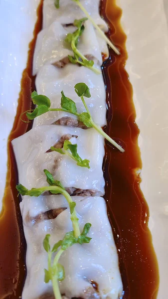 Chinese Steamed Rice Noodle Rolls With beef with soy sauce