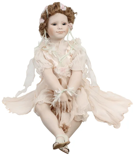 Porcelain doll with pink dress. — Stock Photo, Image