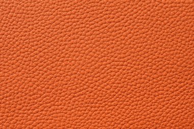 Closeup of seamless orange leather texture clipart