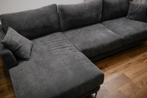 stock image black sofa view from above in the interior of the house