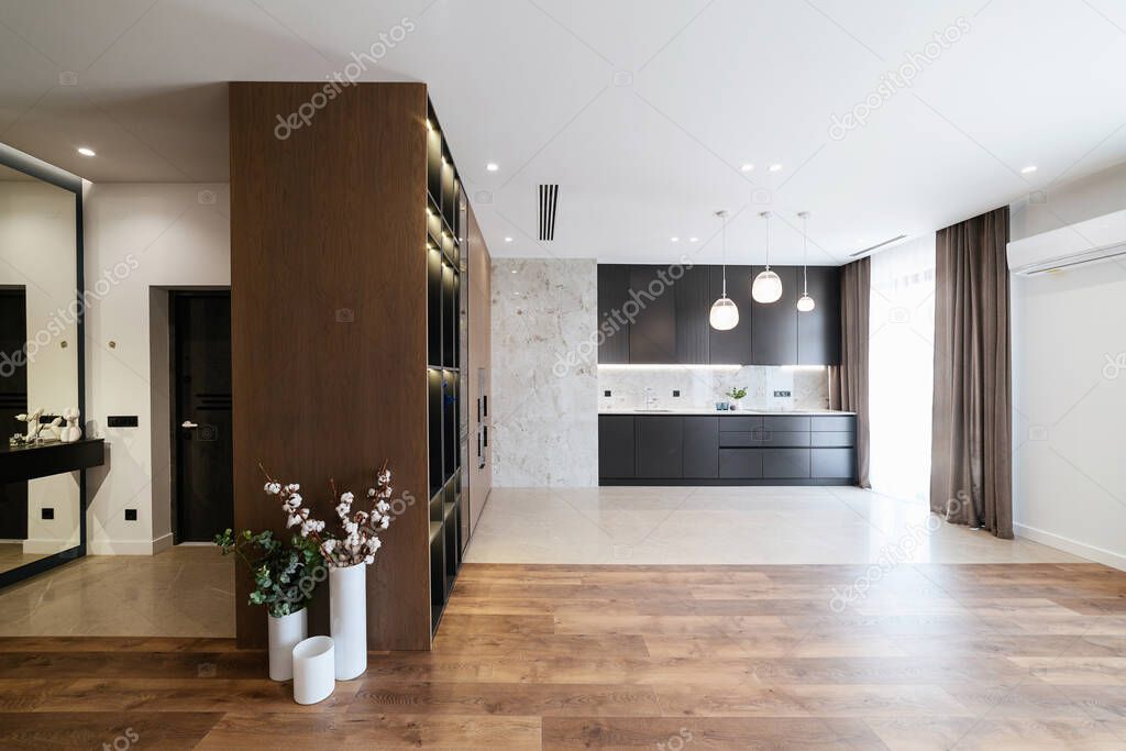 Modern interior design studio kitchen. Black furniture with kitchen
