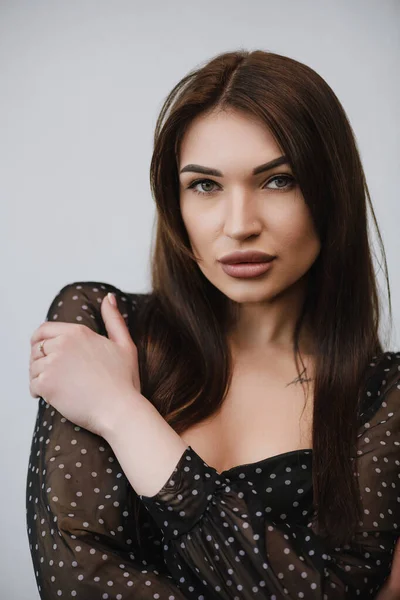 Young Girl Dark Hair Holding Her Shoulder — Stok fotoğraf