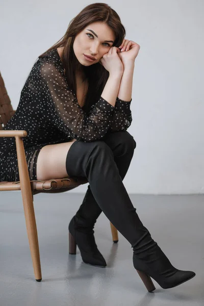 Beautiful Young Girl Dark Clothes Shoes Sitting Chair — 스톡 사진