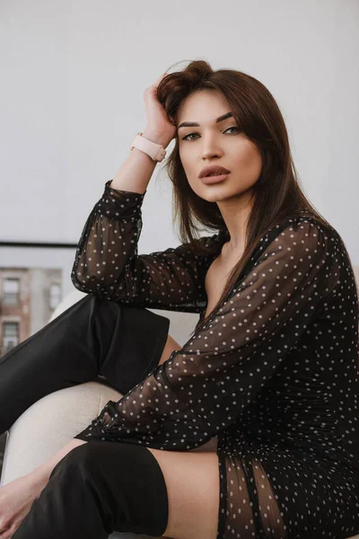 Young Girl Photographs Black Dress Chair — Stockfoto