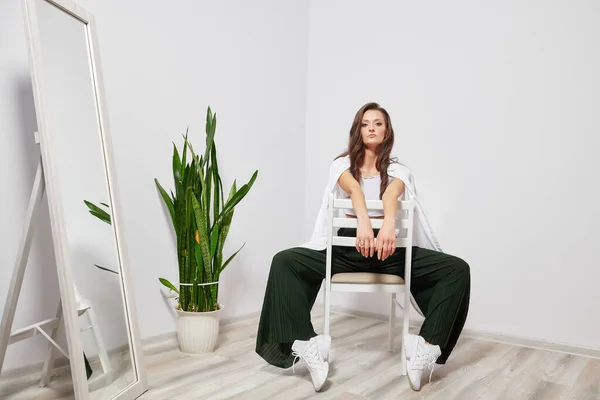 Beautiful Girl Stylish Clothes Sitting White Chair — Stock Photo, Image