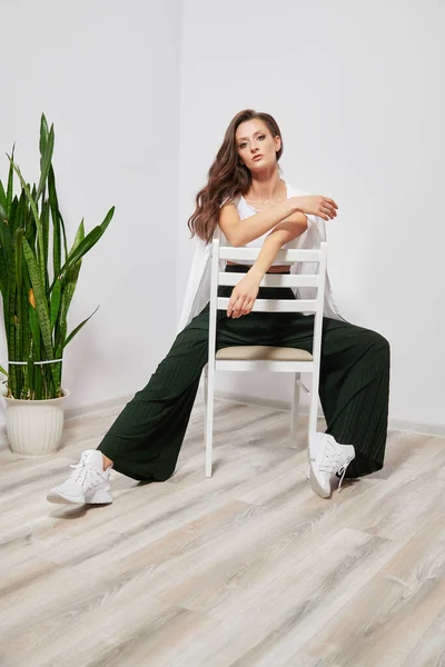 Girl Model Dark Hair Sitting White Wooden Chair Room — 스톡 사진