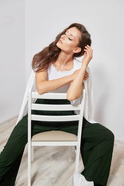 Girl Dark Hair Stylish Clothes Sitting Chair — 스톡 사진
