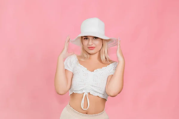 Young Girl White Hat Clothes Posing Pink Background — Stok fotoğraf