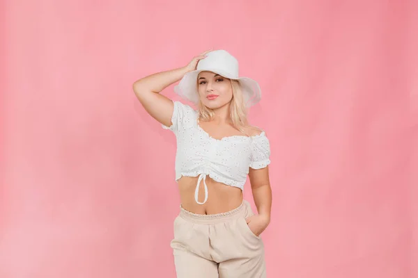 Young Girl White Hat Clothes Posing Pink Background — Stock Fotó