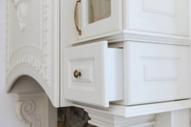 interior design of a modern and stylish bright kitchen in the house