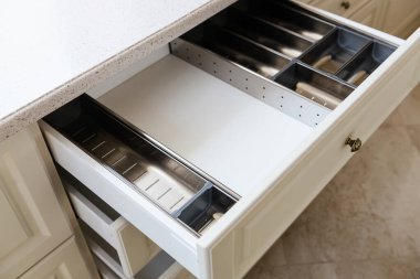 interior design of a modern and stylish bright kitchen in the house