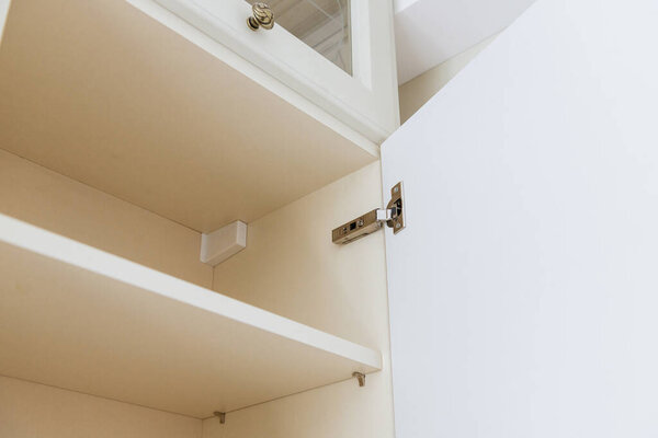 open door in the new white kitchen in the house