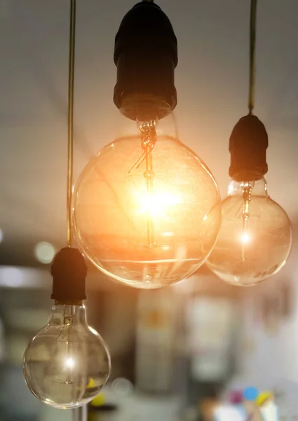 incandescent light bulb, incandescent lamp or incandescent light globe on dark background