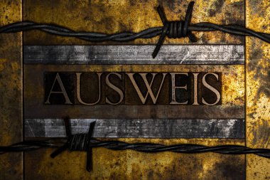 Ausweis text on textured grunge copper and vintage gold background clipart