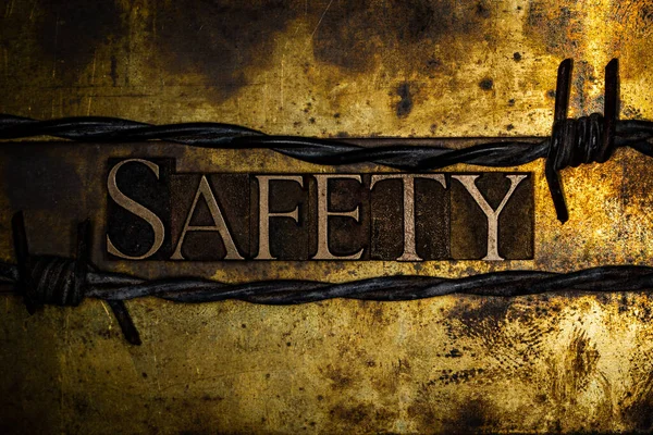 Safety Text Textured Grunge Copper Vintage Gold Background — Stock Photo, Image