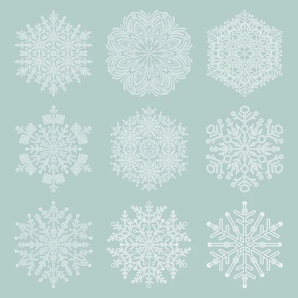 Set von runden Vektor-Schneeflocken mit Winterschmuck — Stockvektor