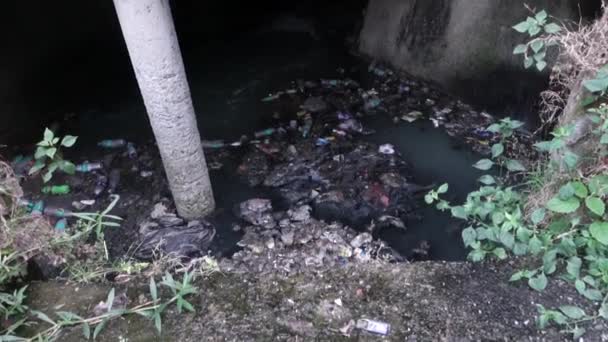 Gutter Full Plastic Toxic Waste Flowing Open — Wideo stockowe