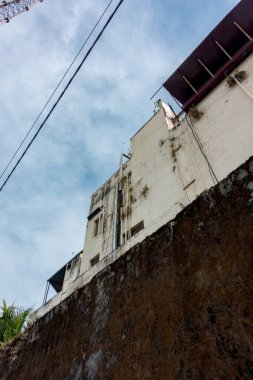 March 7th 2022. Dehradun Uttarakhand India. A wide angle shot of a back of a large building with down pipes and big windows.