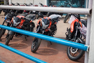 February 23rd 2022. Dehradun Uttarakhand, India. Brand New Bajaj Pulsar Motorcycles parked at a local dealers agency.