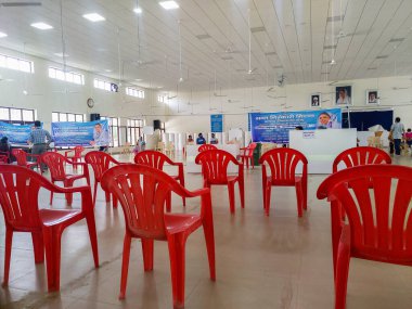 June 24th 2021 Dehradun India. Corona Virus Vaccination drive taking place with chairs and people maintaining social distancing.