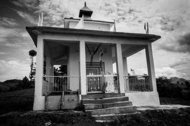 March 3rd 2021 Uttarakhand India. A monochromatic shot of Naag Tibba Mountain Serpent God Temple in rural region of the himalayas.