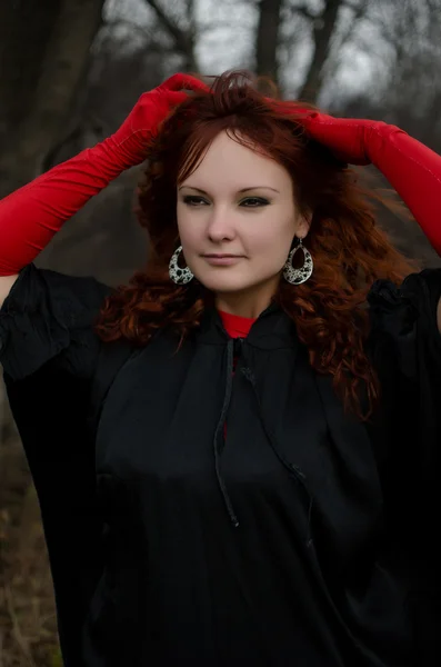 Woman in red gloves — Stock Photo, Image