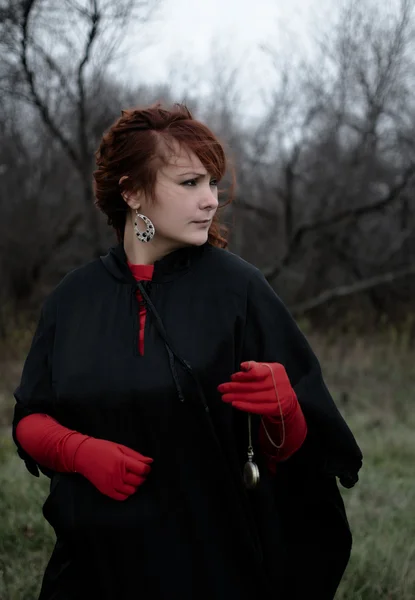 Woman in red gloves — Stock Photo, Image