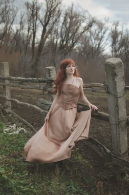 Kızıl saçlı Kadın