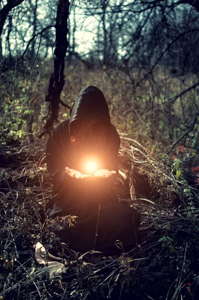 Witch with magic fire — Stock Photo, Image