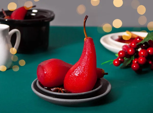 Poached pears in red wine with spices. — Stock Photo, Image