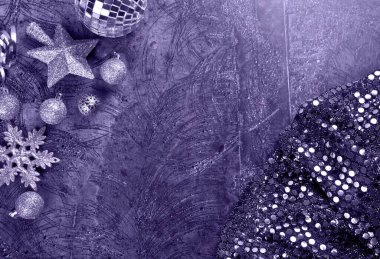 Christmas decoration with 2022 numbers in new pontone color very peri. Top view. Copy space.