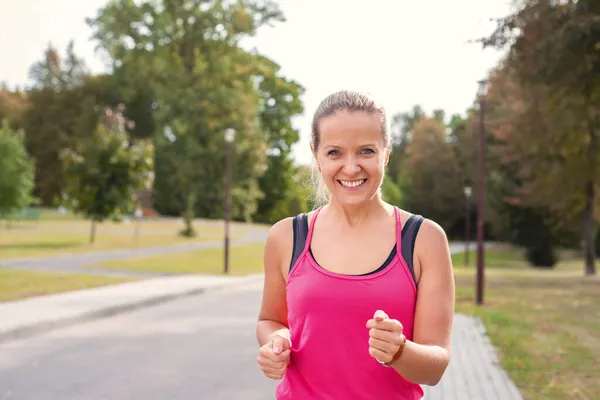 Beautiful Mature Blonde Woman Running Park Sunny Day Healthy Lifestyle Royalty Free Stock Photos