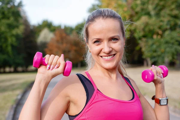 Beautiful Mature Blonde Woman Working Out Dumbbells Running Park Sunny Stock Photo