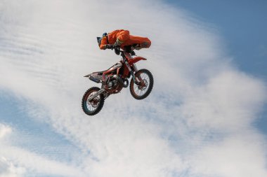 Bikers in flight. Motorcycles in the air. Motorcycle stunts. Motofreestyle stuntriding FMX show. Freestyle motocross mx. Harley Davidson BurgerFest in Prague , Czech Republic September 3 2022