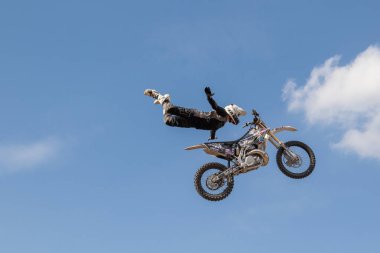 Bikers in flight. Motorcycles in the air. Motorcycle stunts. Motofreestyle stuntriding FMX show. Freestyle motocross mx. Harley Davidson BurgerFest in Prague , Czech Republic September 3 2022