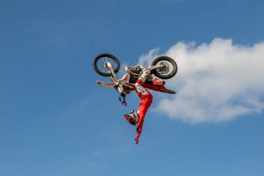 Bikers in flight. Motorcycles in the air. Motorcycle stunts. Motofreestyle stuntriding FMX show. Freestyle motocross mx. Harley Davidson BurgerFest in Prague , Czech Republic September 3 2022