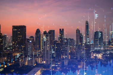 Pazar davranışı hologramı, günbatımı panoramik şehir görüntüsü, Güneydoğu Asya 'da mali derece alabilmek için popüler bir yer. Finansal veri analizi kavramı. Çift pozlama.