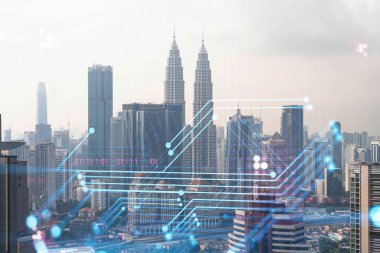 Kuala Lumpur 'un Panorama şehri manzarası üzerinde teknoloji hologramı. KL, Asya 'nın Malezya' daki en büyük teknoloji merkezidir. Kodlama ve yüksek teknoloji geliştirme kavramı. Çift pozlama.