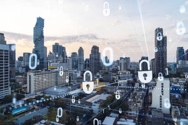 Güneydoğu Asya, Bangkok 'un günbatımı panoramik şehir manzarasında Padlock' un hologramı. Siber güvenlik istihbaratı kavramı. Çoklu pozlama.