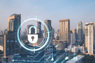 Güneydoğu Asya, Bangkok 'un günbatımı panoramik şehir manzarasında Padlock' un hologramı. Siber güvenlik istihbaratı kavramı. Çoklu pozlama.