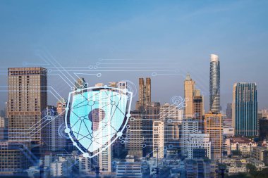 Güneydoğu Asya, Bangkok 'un günbatımı panoramik şehir manzarasında Padlock' un hologramı. Siber güvenlik istihbaratı kavramı. Çoklu pozlama.