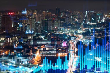 Borsa grafiği hologramı, Kuala Lumpur 'un gece manzarası. KL, Malezya, Asya 'da mali eğitim almak için popüler bir yerdir. Uluslararası araştırma kavramı. Çift pozlama.