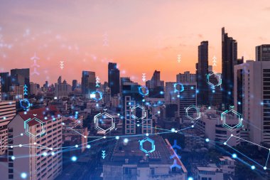 Parlak teknolojik süreç hologramı, gün batımında Bangkok 'un havadan panoramik manzarası. Güneydoğu Asya 'daki en büyük yenilikçi teknoloji merkezi. Çoklu pozlama.