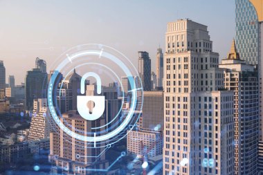 Güneydoğu Asya, Bangkok 'un günbatımı panoramik şehir manzarasında Padlock' un hologramı. Siber güvenlik istihbaratı kavramı. Çoklu pozlama.